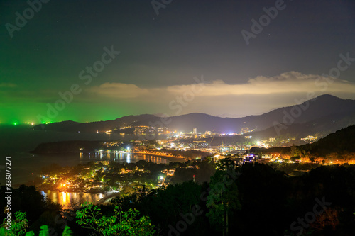 Magnificent scenic view over beautiful Andaman sea and three bays at Karon Viewpoint at night, Phuket, Thailand