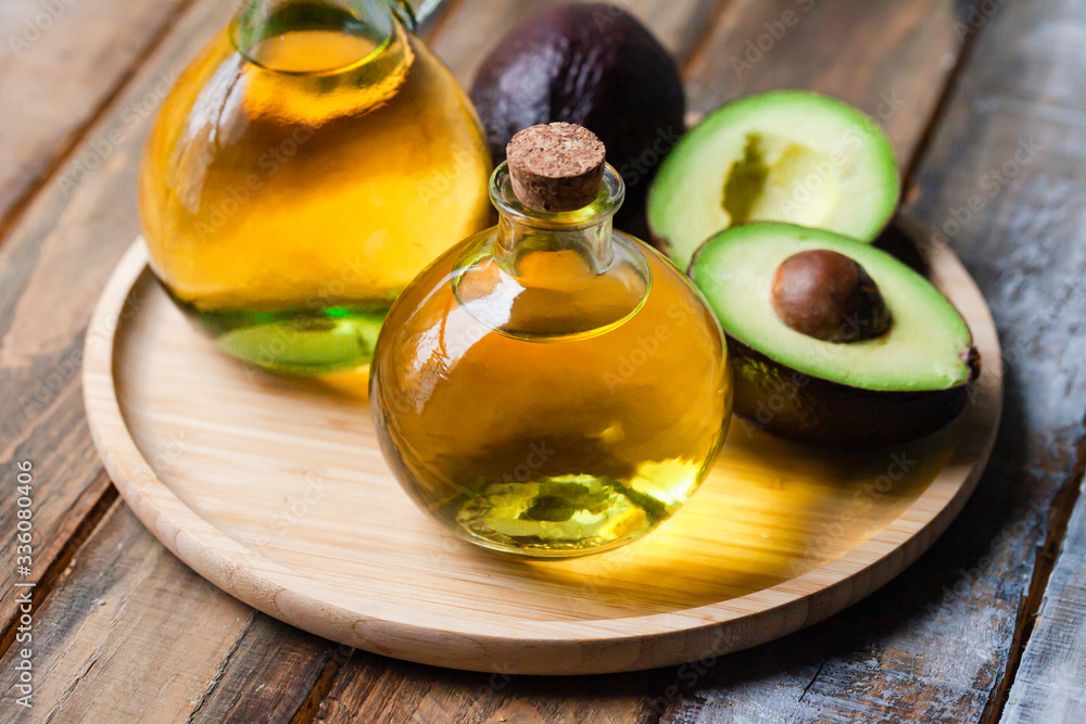 Concept of natural organic oil in cosmetology. Moisturizing skin care and aromatherapy. Gentle body treatment. Atmosphere of harmony relax. Wooden background, avocado. Close up, macro
Concept of natural organic oil in cosmetology. Moisturizing skin care and aromatherapy. Gentle body treatment. Atmosphere of harmony relax. Wooden background, avocado. Close up, macro