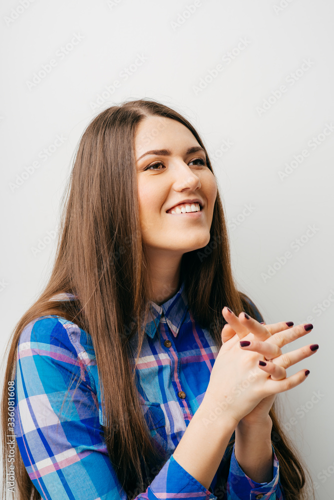 Young girl praying isolated on white background Young girl praying isolated on white background