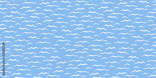 Ocean waves seamless repeat pattern white on blue background for fabric surface design
