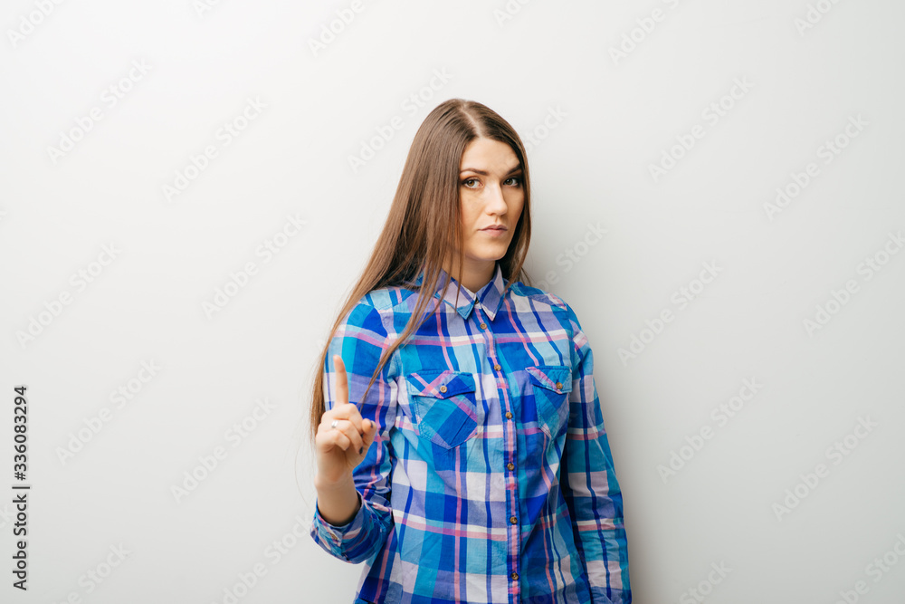 Business woman pointing an idea and smiling - isolated over white Business woman pointing an idea and smiling - isolated over white