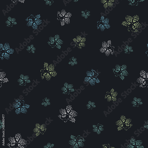 Spotted floral shapes on a black background seamless vector pattern. Moody surface print design. Fora fabrics, stationery and packaging.