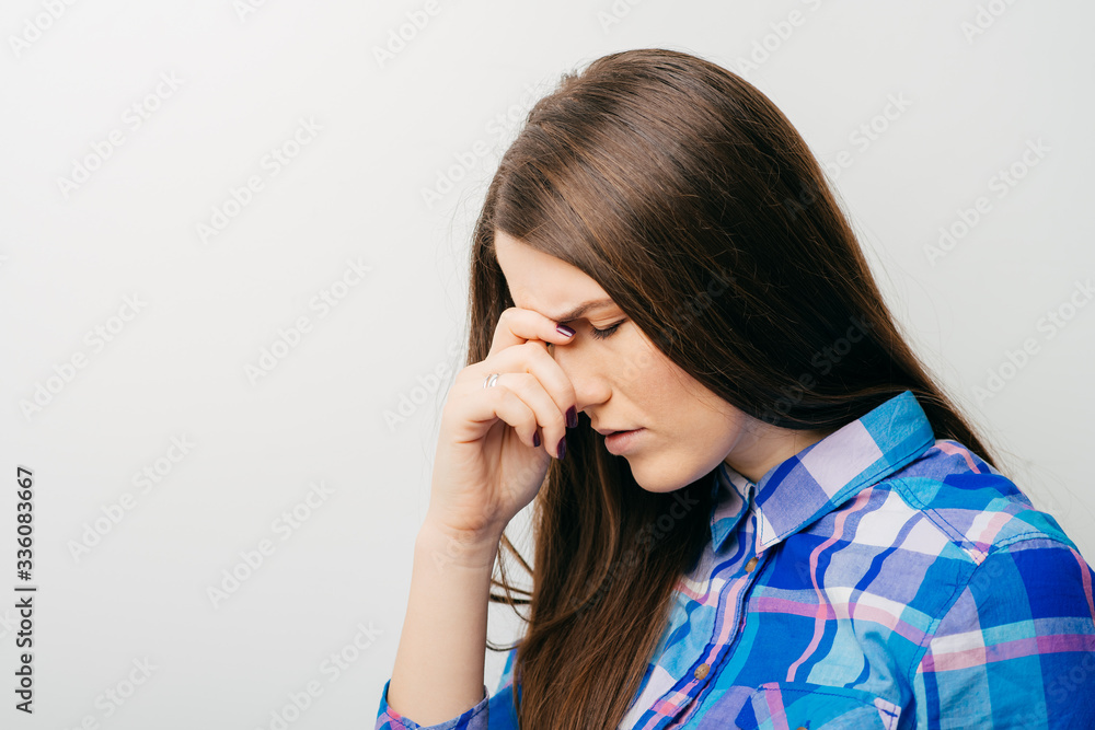 Closeup portrait young woman, scratching head, thinking, daydreaming deeply about something, looking up, isolated white background. Human facial expressions, emotions, feeling, sign, symbols, reaction Closeup portrait young woman, scratching head, thinking, daydreaming deeply about something, looking up, isolated white background. Human facial expressions, emotions, feeling, sign, symbols, reaction