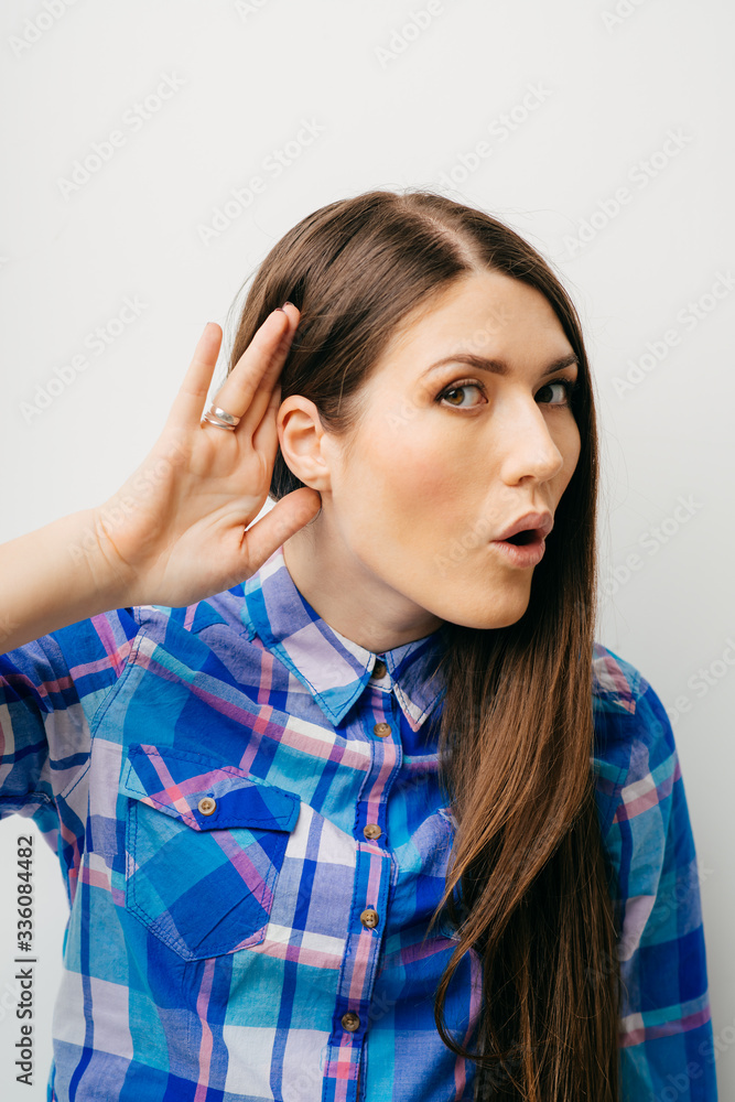 on a white background young girl overhears