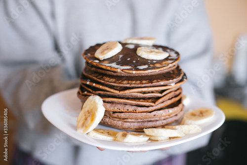 Choolate pancakes with bananas photo