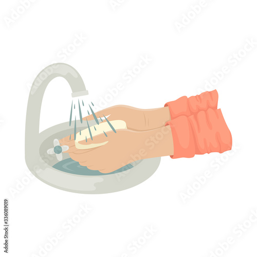 A man washes his hands with soap in the sink under the running water from the tap. Fighting the coronavirus.