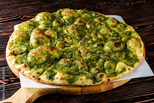 Focaccia with Pesto. Close up Pizza photo