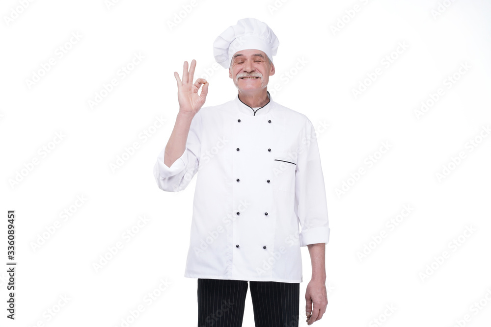 Elderly professional chef senior man, posing with okay single, isolated over white background Elderly professional chef senior man, posing with okay single, isolated over white background