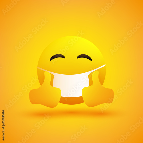 Simple Emoticon with Closed Eyes, Showing Thumbs Up and Wearing Medical Mask - Vector Design on Yellow Background