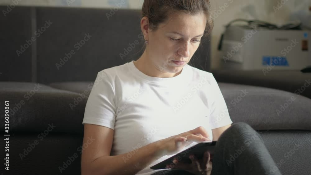Woman use digital tablet at home Woman use digital tablet at home