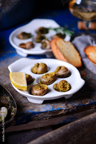 Burgundy escargot with herb butter.style rustic.