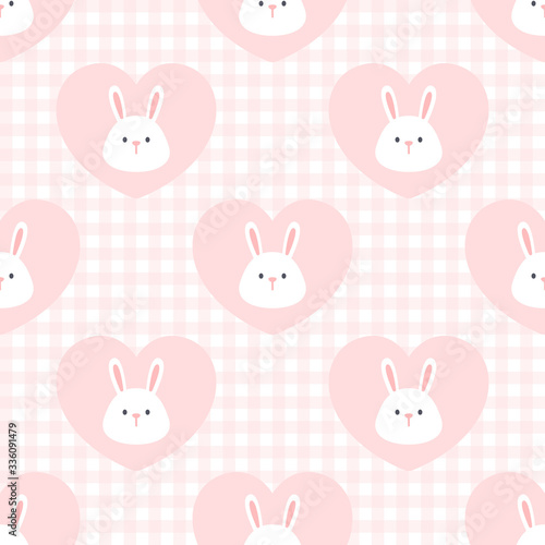 Cute rabbit in a heart seamless pattern background