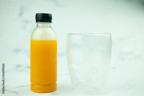 Orange juice in plastic bottle