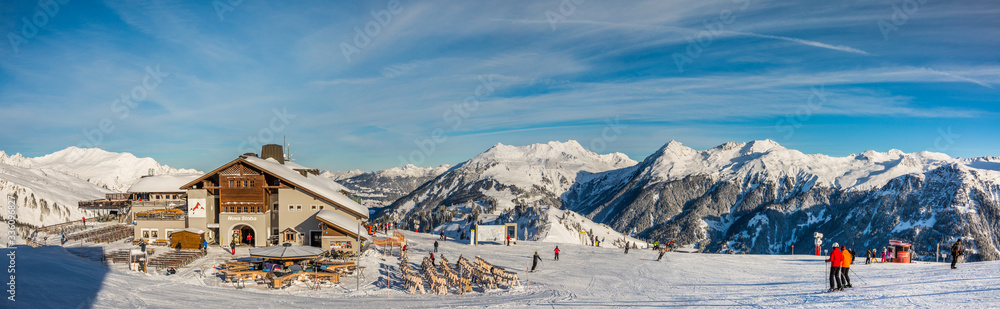 Gaschurn, Vorarlberg, Austria, January 2020, Restaurant Nova Stoba, eating house with the snow covered mountain range - panoramic view 