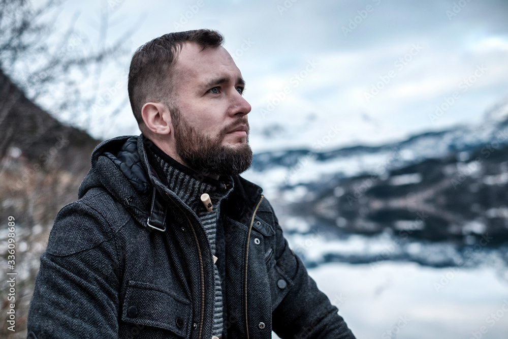 Man sitting near Hardangerfjord, Norway. Man sitting near Hardangerfjord, Norway.