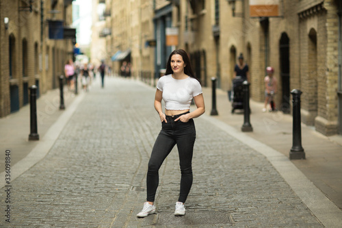 Portrait of a young woman in the street