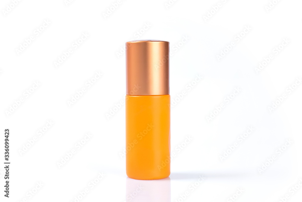 Orange cosmetic plastic bottle isolated on white background Orange cosmetic plastic bottle isolated on white background