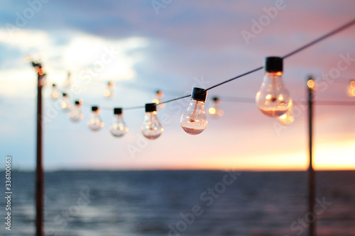 String Lights during sunset. Sea background. Abstract background.  © frecca