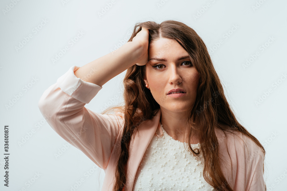 on a gray background young girl on a gray background young girl