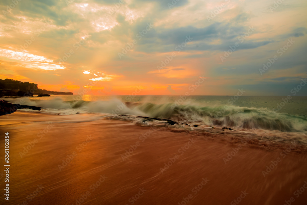 Seascape. Sunset time at the beach. Ocean with strong waves. Ocean background. Tegal Wangi beach, Bali, Indonesia
