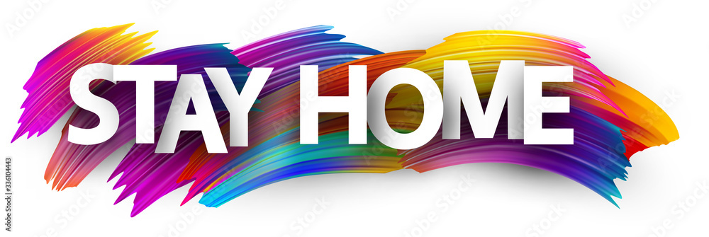 Big stay home sign over brush strokes background.