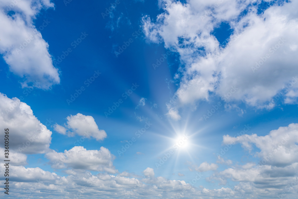 beautiful nature of blue sky with clouds and sun shines bright in the day