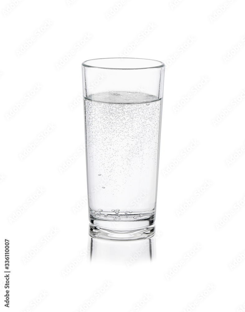 Pure fresh mineral water with bubbles in glass isolated on white background Pure fresh mineral water with bubbles in glass isolated on white background