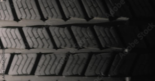 Spinning tire of a car slowing down, sutable for vertical video photo