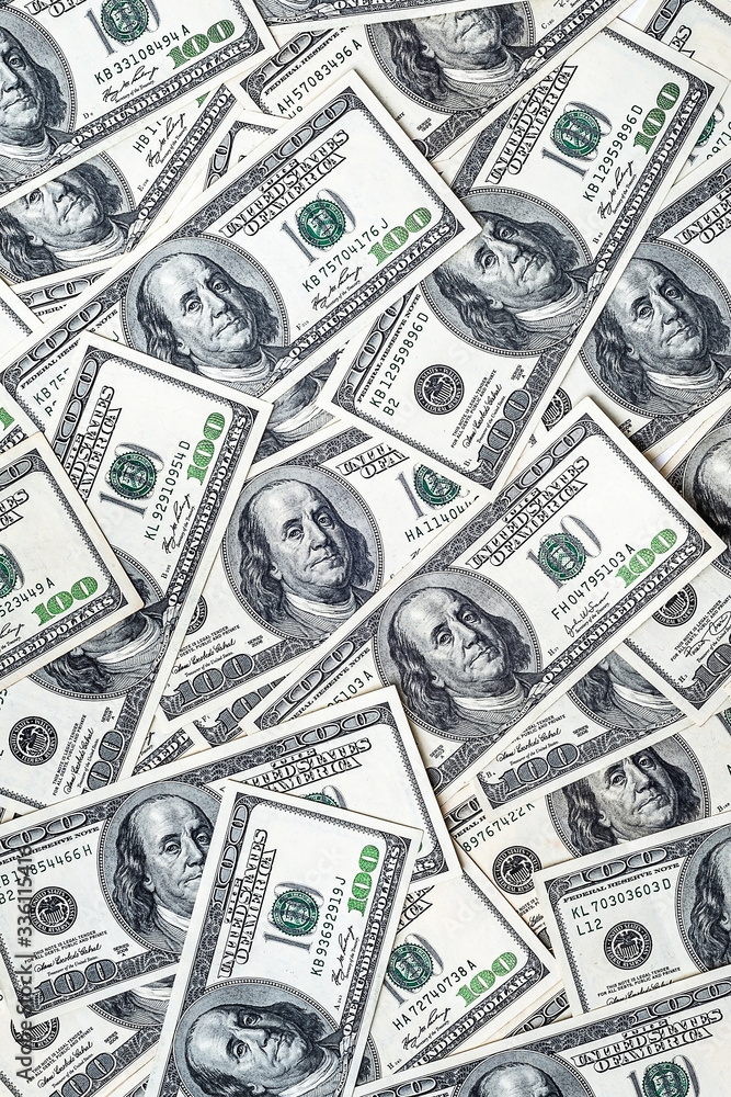 One hundred dollars. Money supply. US dollars banknotes background. Hundred dollar bills. American currency. One hundred dollars. Money supply. US dollars banknotes background. Hundred dollar bills. American currency.