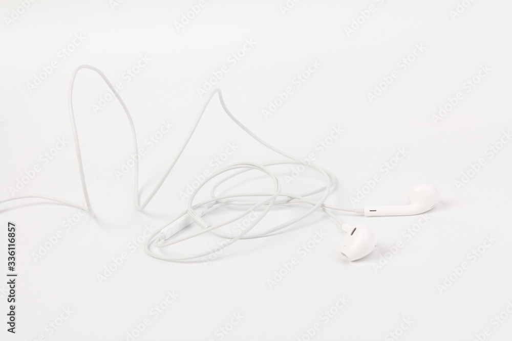 Obraz premium White headphones with headset on white isolated background