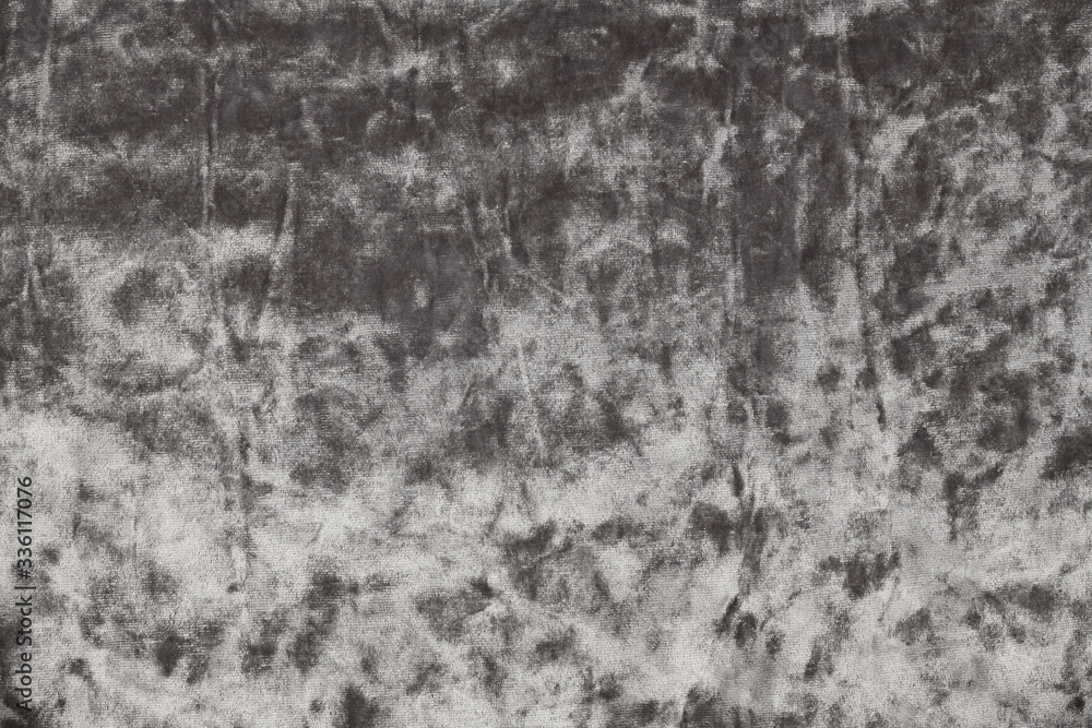 Texture of grey wrinkled velvet fabric
