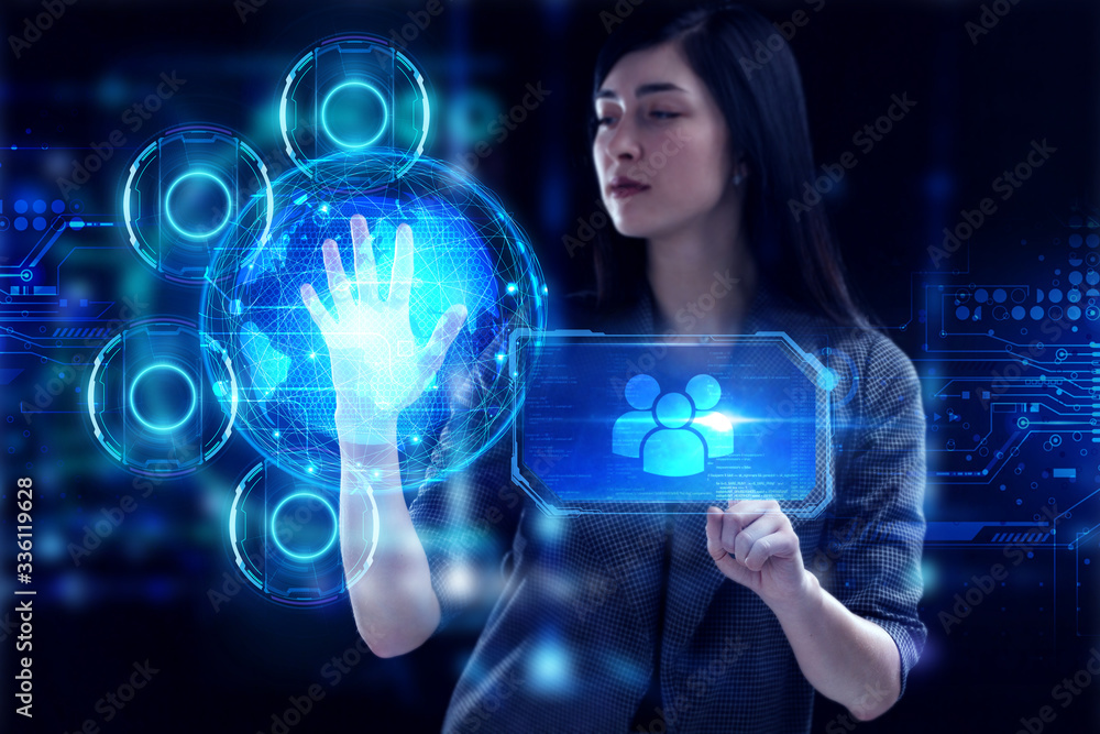 Business, Technology, Internet and network concept. Young businessman working on a virtual screen of the future and sees the inscription: Business, Technology, Internet and network concept. Young businessman working on a virtual screen of the future and sees the inscription: