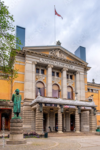 Oslo, Norway - National Theatre historic building - Nationaltheatret - at the Karl Johans Gate and Stortingsgata streets in city center historic quarter photo