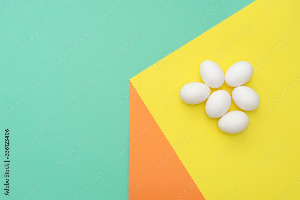 White easter eggs on 3D effect background. White easter eggs on 3D effect background.