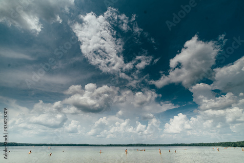 beautiful voluminous sky by the lake © kunitskiy