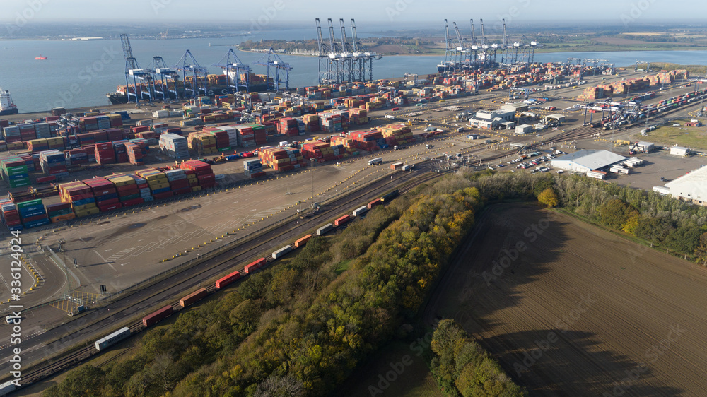 Shipping Port with Freight Trains in the early morning sunshine