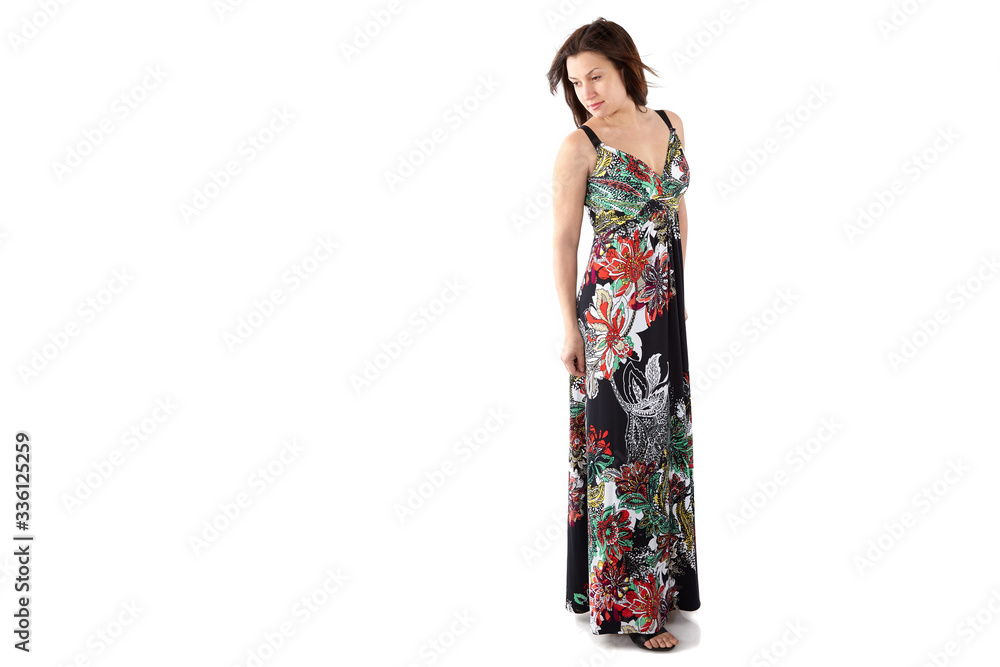 young beautiful woman in sundress with colorful flower pattern young beautiful woman in sundress with colorful flower pattern