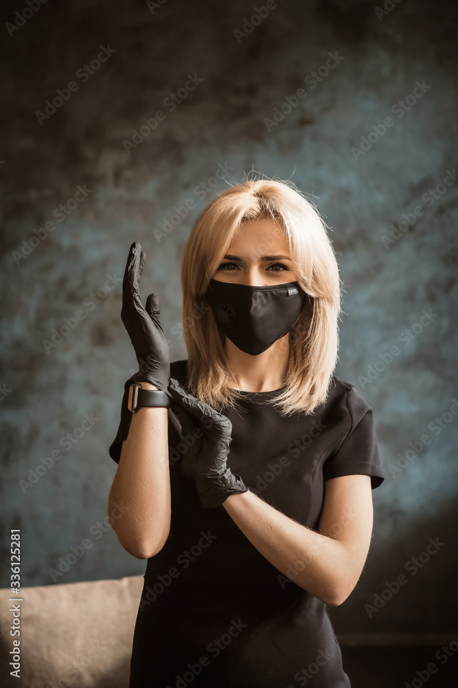 Fototapeta premium girl in a mask and gloves