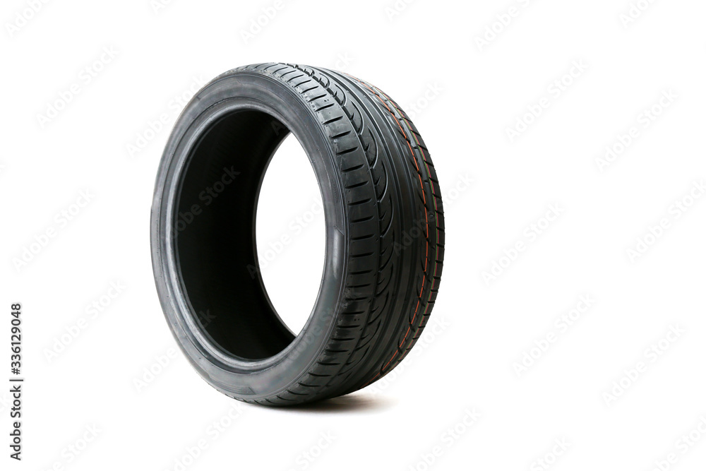 car tire with directional rotation isolated on a white background. new modern low profile car tyre car tire with directional rotation isolated on a white background. new modern low profile car tyre