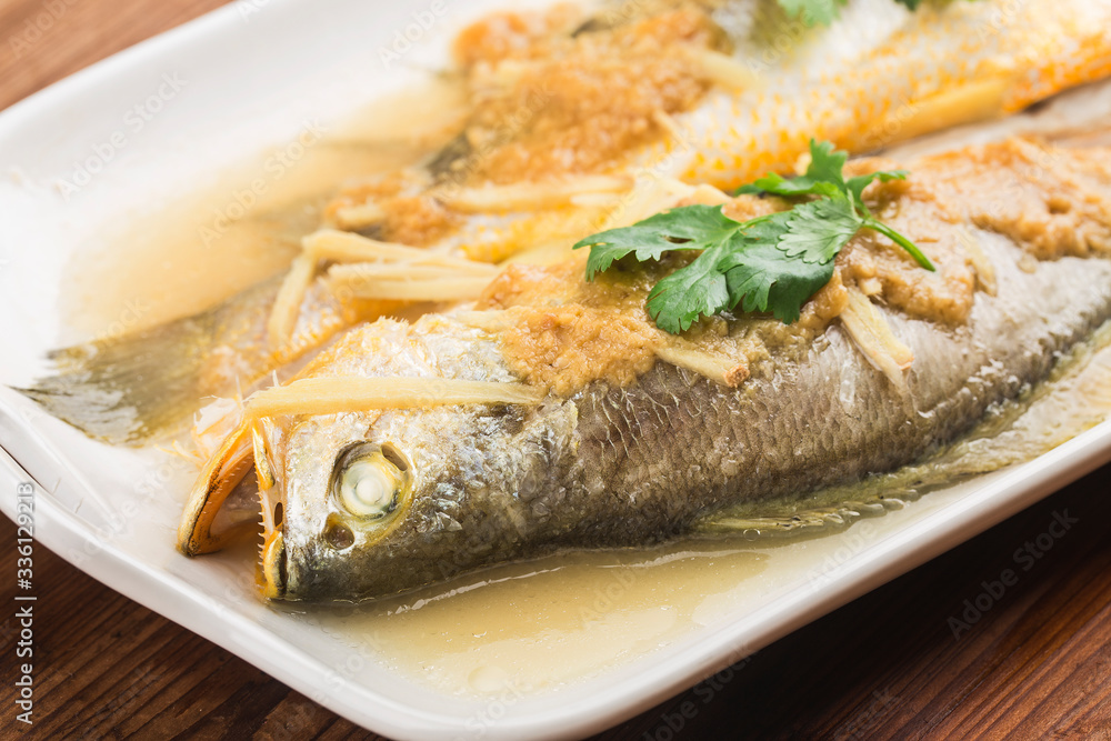 Oriental cuisine, traditional Chinese cuisine, steamed yellow croaker,