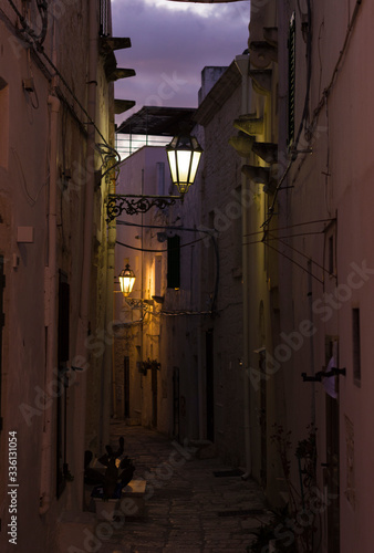 Old narrow town street in historic center of Ostuni  Italy