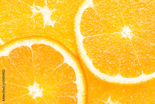 Macro close up photo of sliced orange  from above. Slice of juicy orange. photo