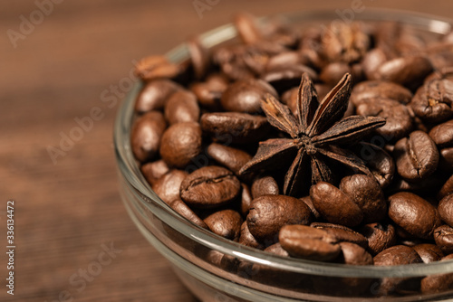 coffee beans with christmas spices in a glass bowl