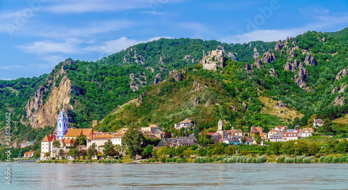 Durnstein, Wachau, Austria - August, 2011: Skyline of the town on the banks of the Danube with the church and the Dürnstein Castle at the top.