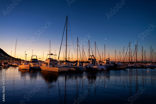 Boats anchored in the harbor, Gordons Bay South Africa.