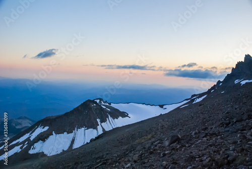 Glaciers and sunset on high mountain slope