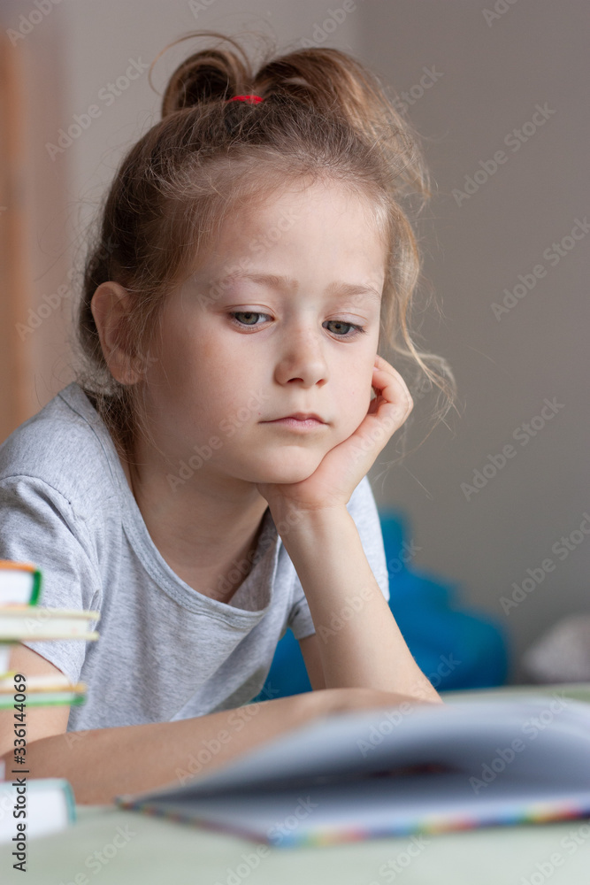 cute little girl with books in room cute little girl with books in room