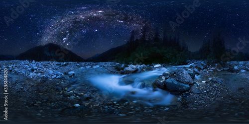 the milky way arc over mountain river in the middle of the forest on a long exposure. Spherical panorama 360vr