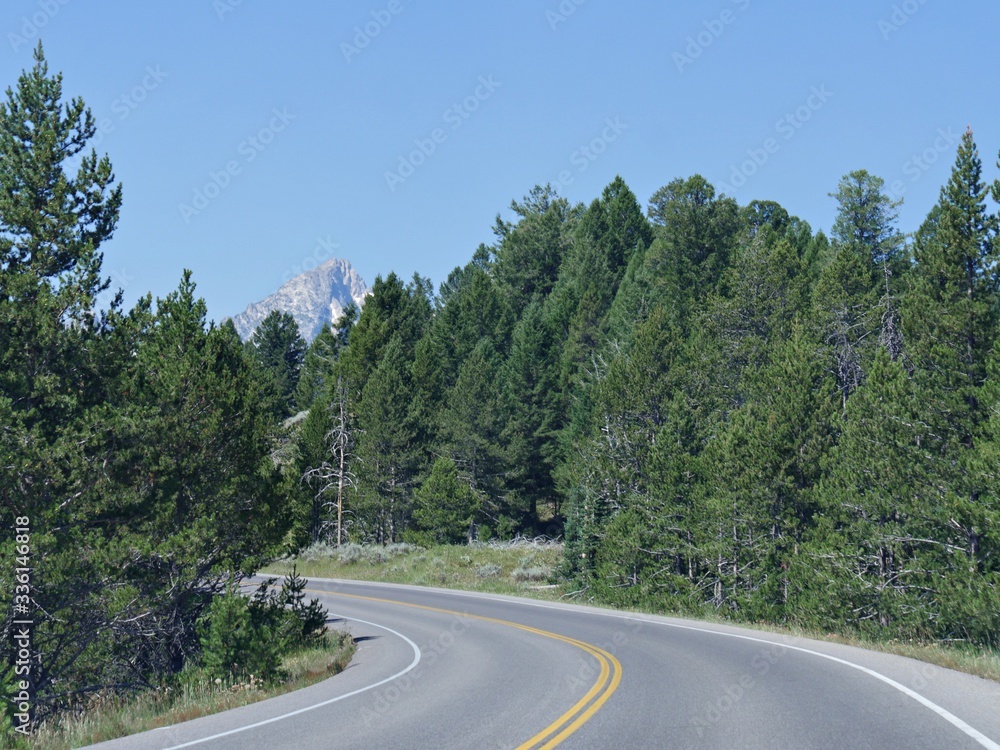 Scenic drive through winding roads at the Grand Teton National Park, Wyoming.