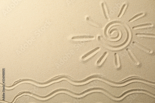 Picture of sun and waves on sea sand background